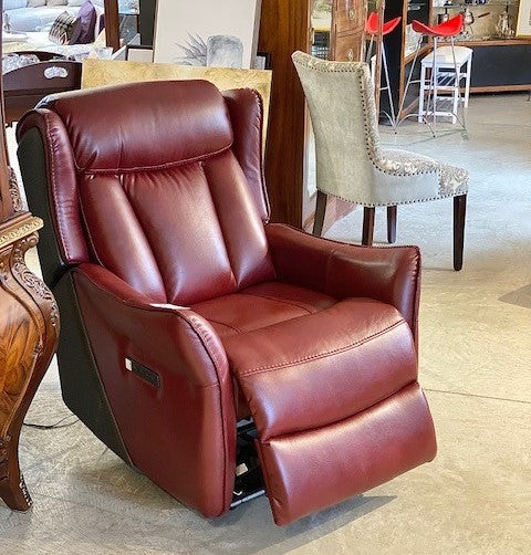 Red leather theatre style recliner as NEW Champagne Taste Home